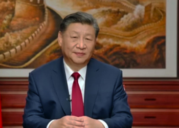 President Xi Jinping van China tijdens zijn nieuwjaarstoespraak. Beeld CGTN
