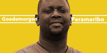 MARIO2600 1 17 Het is wederom bewezen. Als je vanuit het buitenland komt in landen als Suriname hoef je je niet druk te maken over jouw duister of discutabel verleden, je komt heel makkelijk aan de bak. Vooral wanneer je een vlotte babbel hebt of wanneer je over weinig pigment beschikt. Icing on the cake is wanneer je kristalblauwe kijkers hebt, die kunnen spotten dat mensen in zwijm voor je vallen.