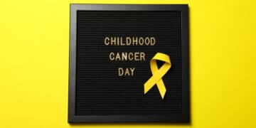 Black board with the inscription Childhood Cancer Day