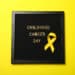 Black board with the inscription Childhood Cancer Day