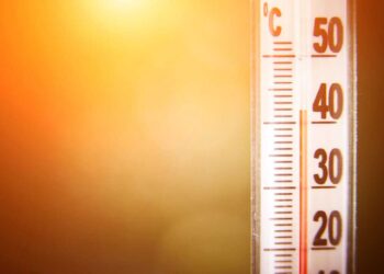 heat wave and thermometer showing for high temperature
