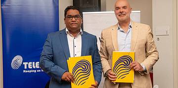 DSC01335 N.V. Telesur heeft de samenwerking met Orange Wholesale verlengd en uitgebreid om de internationale connectiviteit van Suriname verder te versterken. Met het nieuwe vijfjarige contract, dat ingaat in augustus 2025, verzekert het telecombedrijf zich van 100 Gbps aan extra transport- en IP-capaciteit op de Paramaribo– Albina–Cayenne–Martinique-route via de Kanawa-zeekabel.