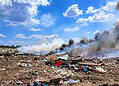 Smoke Over a Sunlit Landfill The fire at the Ornamibo landfill is largely under control, but firefighting operations will continue for several more days due to its scale and smoke development. Structural measures remain necessary to prevent a recurrence.